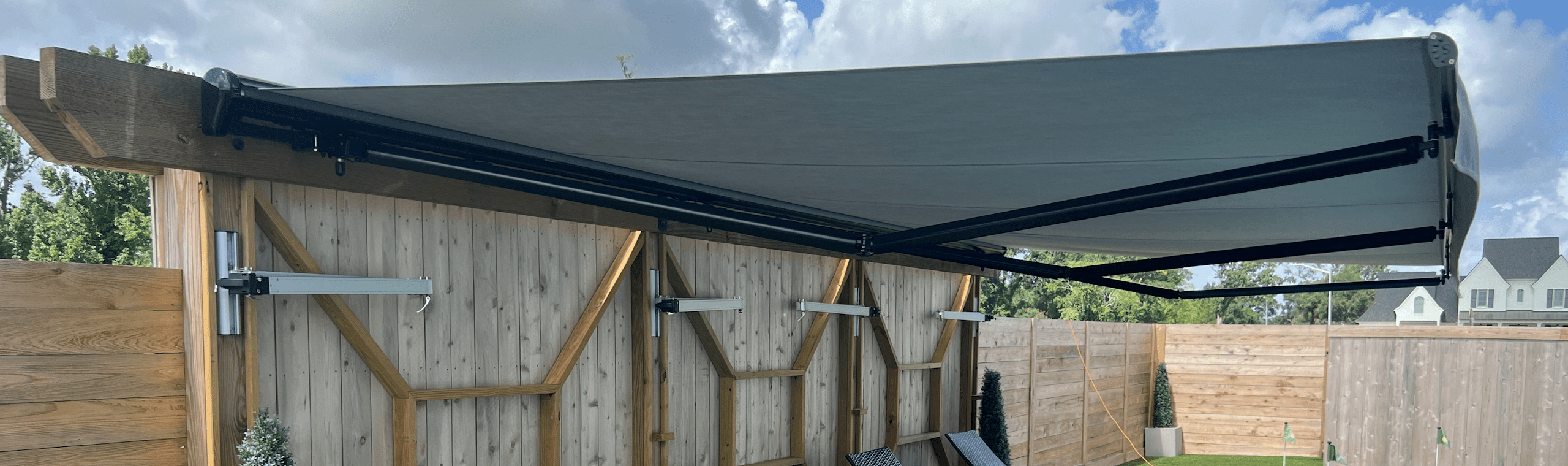 Electric patio awning with remote control in Lafayette residential homes